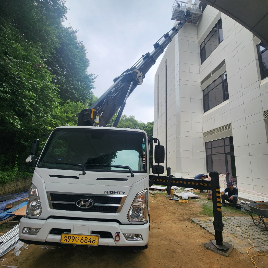 자재 양중 스카이차 작업사진
